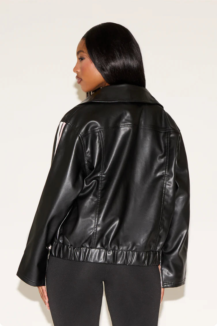 Person wearing a black leather jacket on a white background