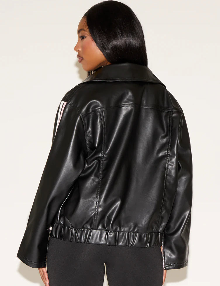 Person wearing a black leather jacket on a white background