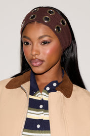 STRETCHY HEADBAND WITH METAL GROMMETS