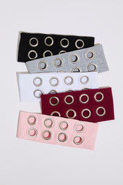 RIB KNIT HEADBAND WITH GROMMET DETAIL