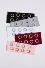 RIB KNIT HEADBAND WITH GROMMET DETAIL