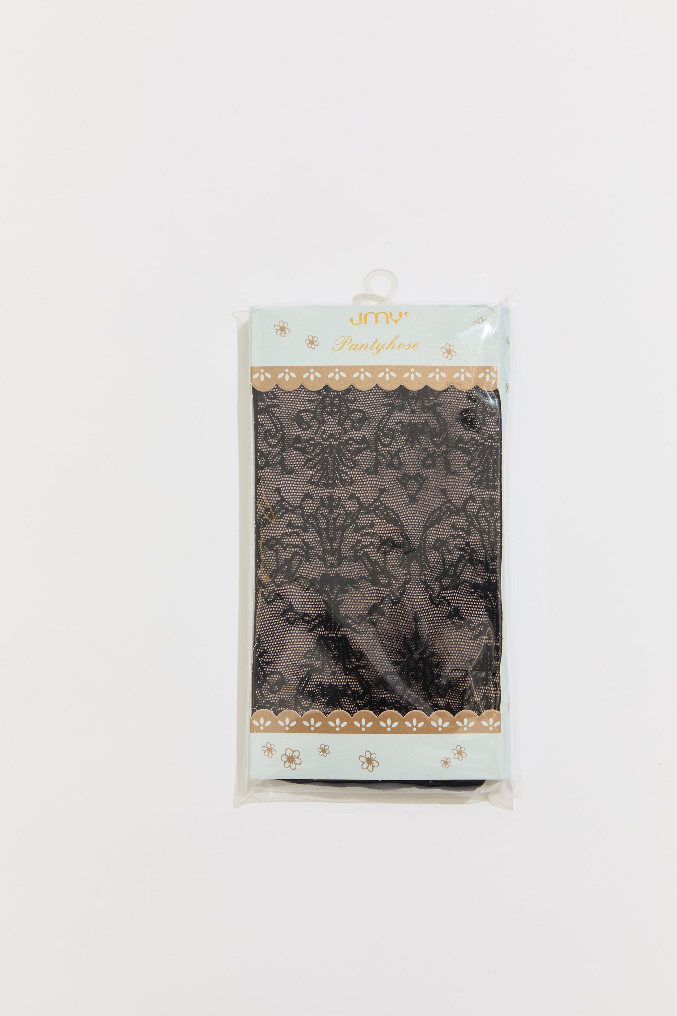 Packaged lace trim with a decorative pattern on a white background