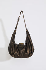 STUDDED CRESCENT SLOUCHY LEATHER SHOULDER BAG on a white background.