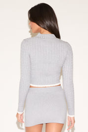 TURTLENECK CABLE KNIT ZIP UP SWEATER