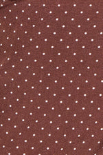Brown fabric with white polka dot pattern