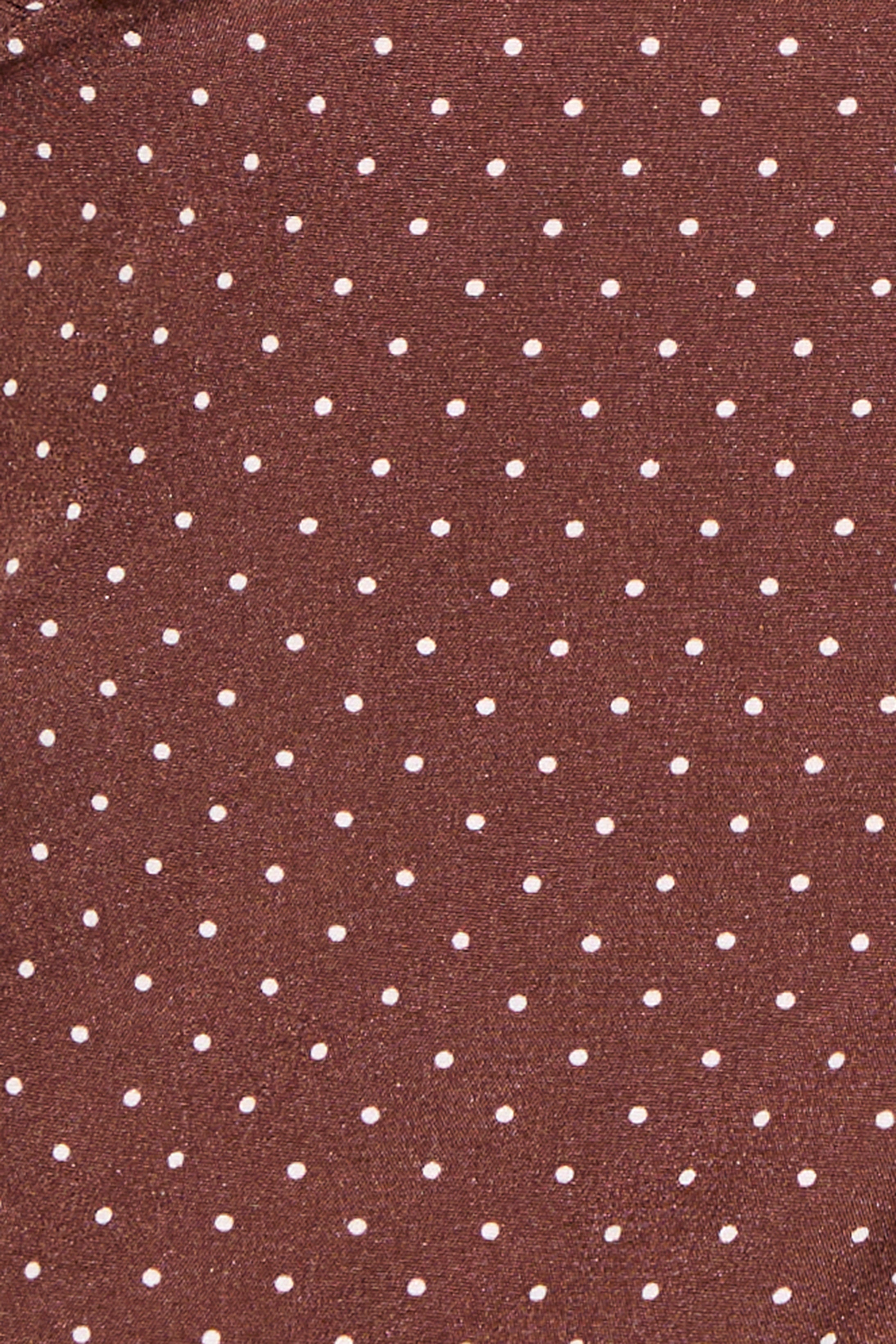 Brown fabric with white polka dot pattern