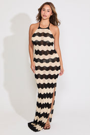 Woman wearing chevron crochet print dress