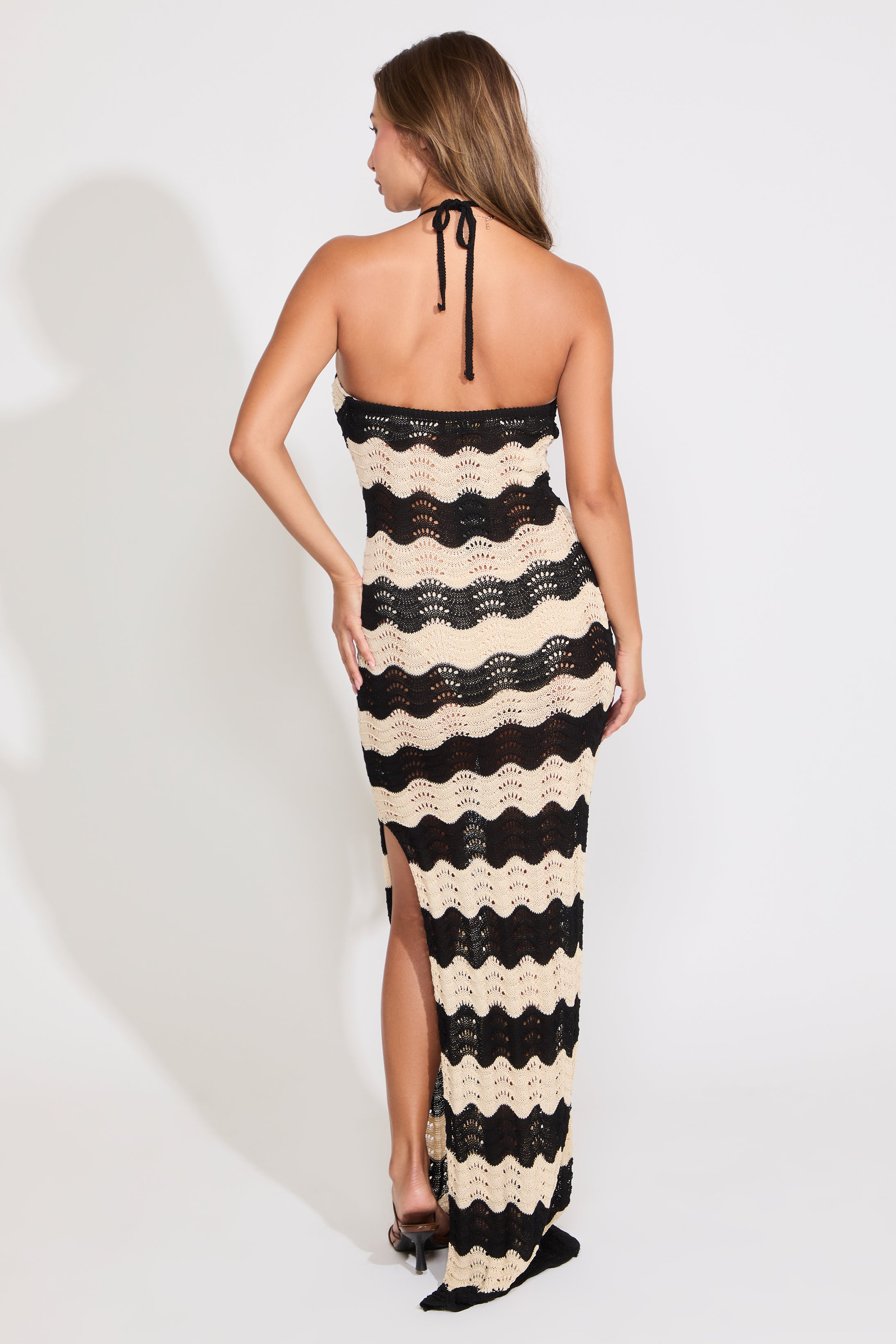 Woman wearing chevron crochet print dress