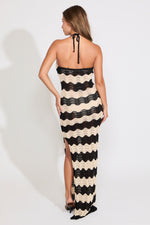 Woman wearing chevron crochet print dress
