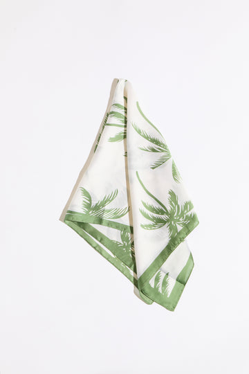 Palm tree and border silk scarf on a white background.