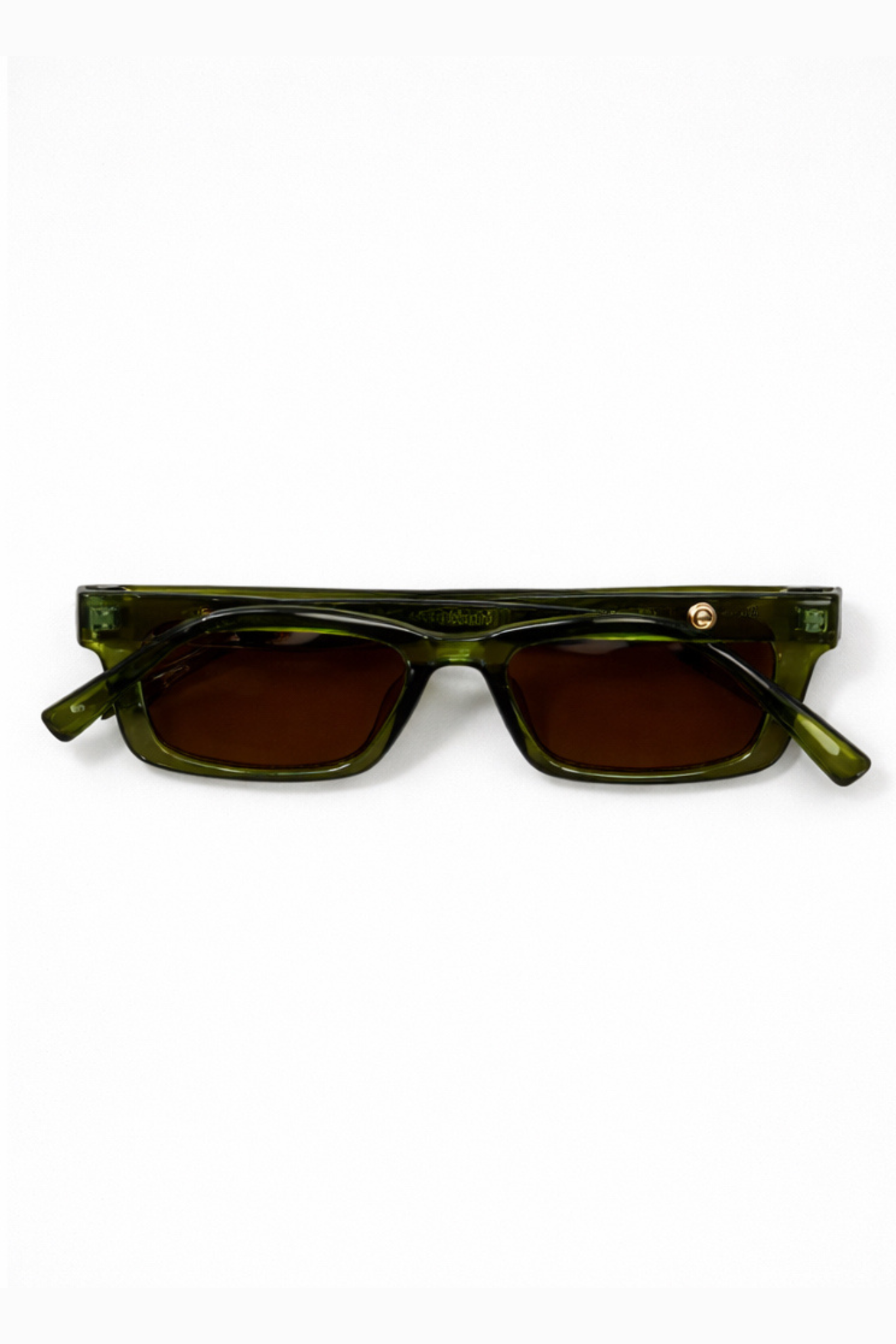 Green sunglasses with brown lenses on a white background
