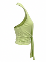 Ghost cut image of a melon green PLUNGING HALTER TWISTED TIE FRONT CROP TOP on a white background.