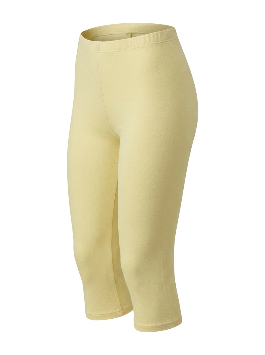 Ghost image of a light-yellow HIGH WAISTED BASIC CAPRI LEGGING on a white background. 