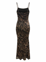 Ghost cut image of a brown ZEBRA PRINT SLEEVELESS DROP WAIST MAXI DRESS on a white background.