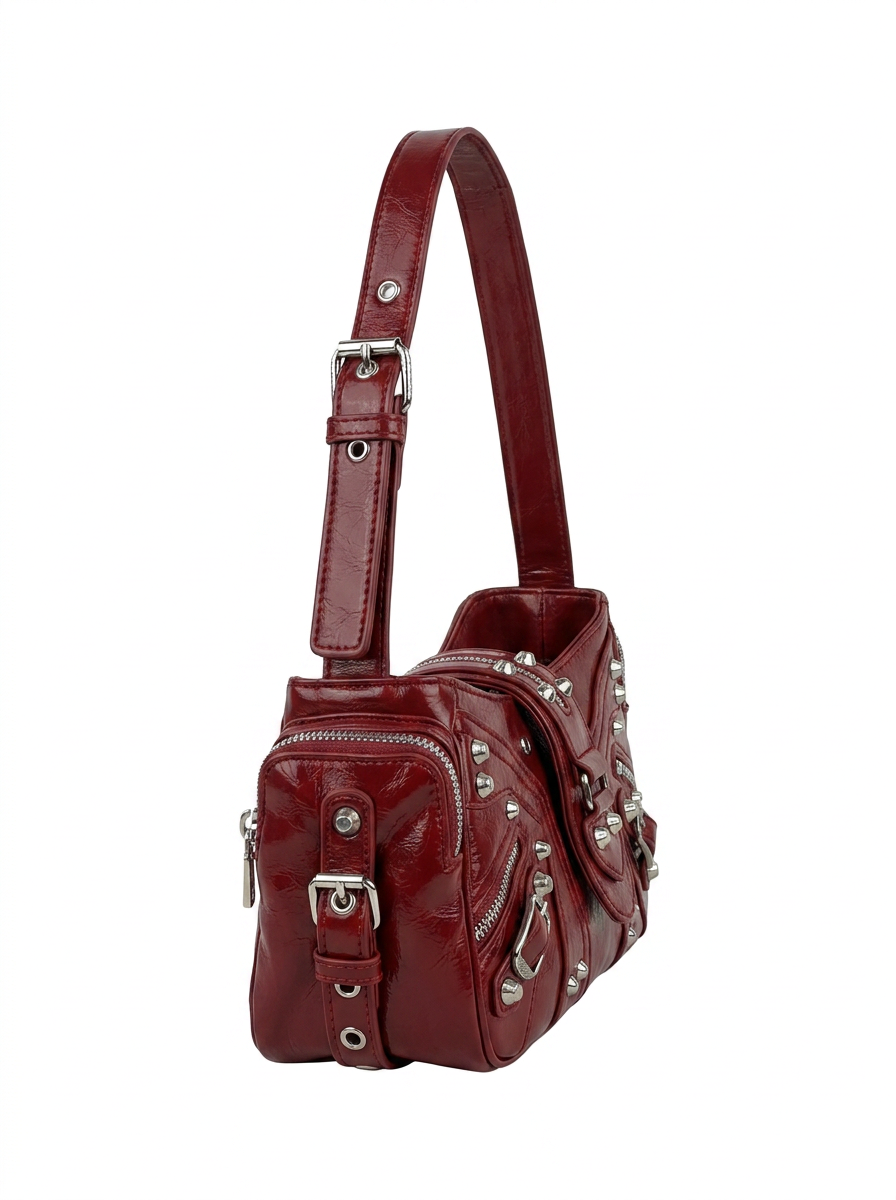 STUDDED RIVET AND MULTI ZIPPER VEGAN LEATHER BAG