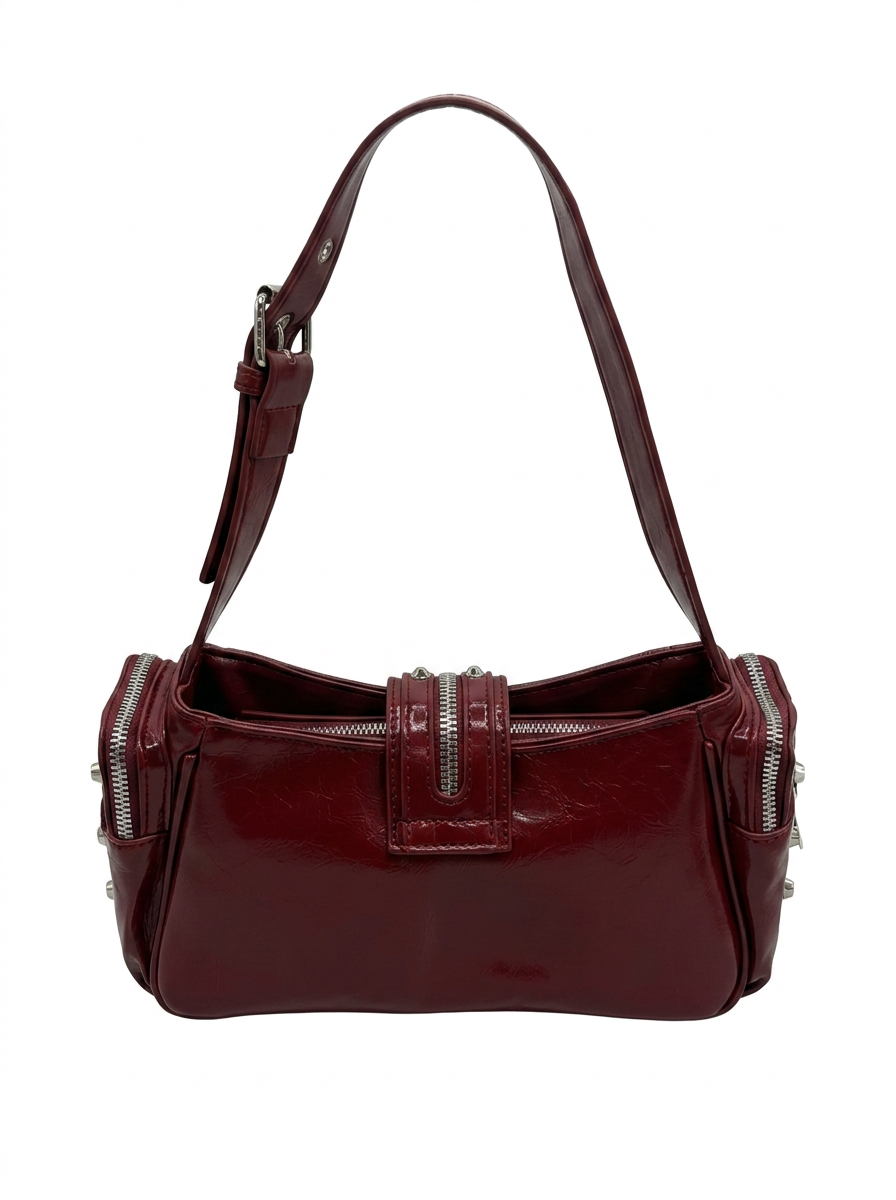 STUDDED RIVET AND MULTI ZIPPER VEGAN LEATHER BAG