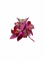 A pink TRIPLE FLOWER CLAW CLIP on a white background.