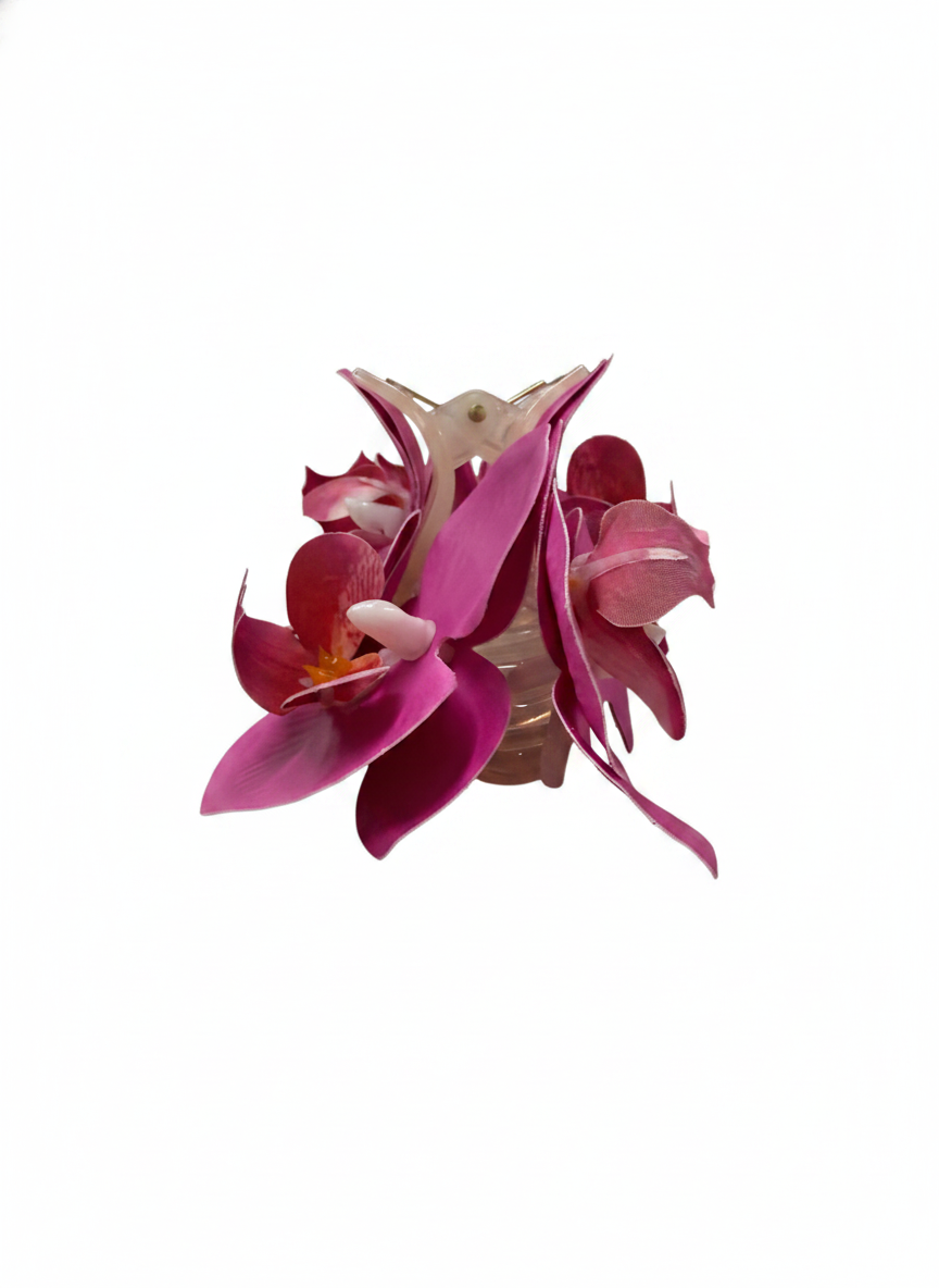 A pink TRIPLE FLOWER CLAW CLIP on a white background.