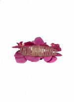 A pink TRIPLE FLOWER CLAW CLIP on a white background.