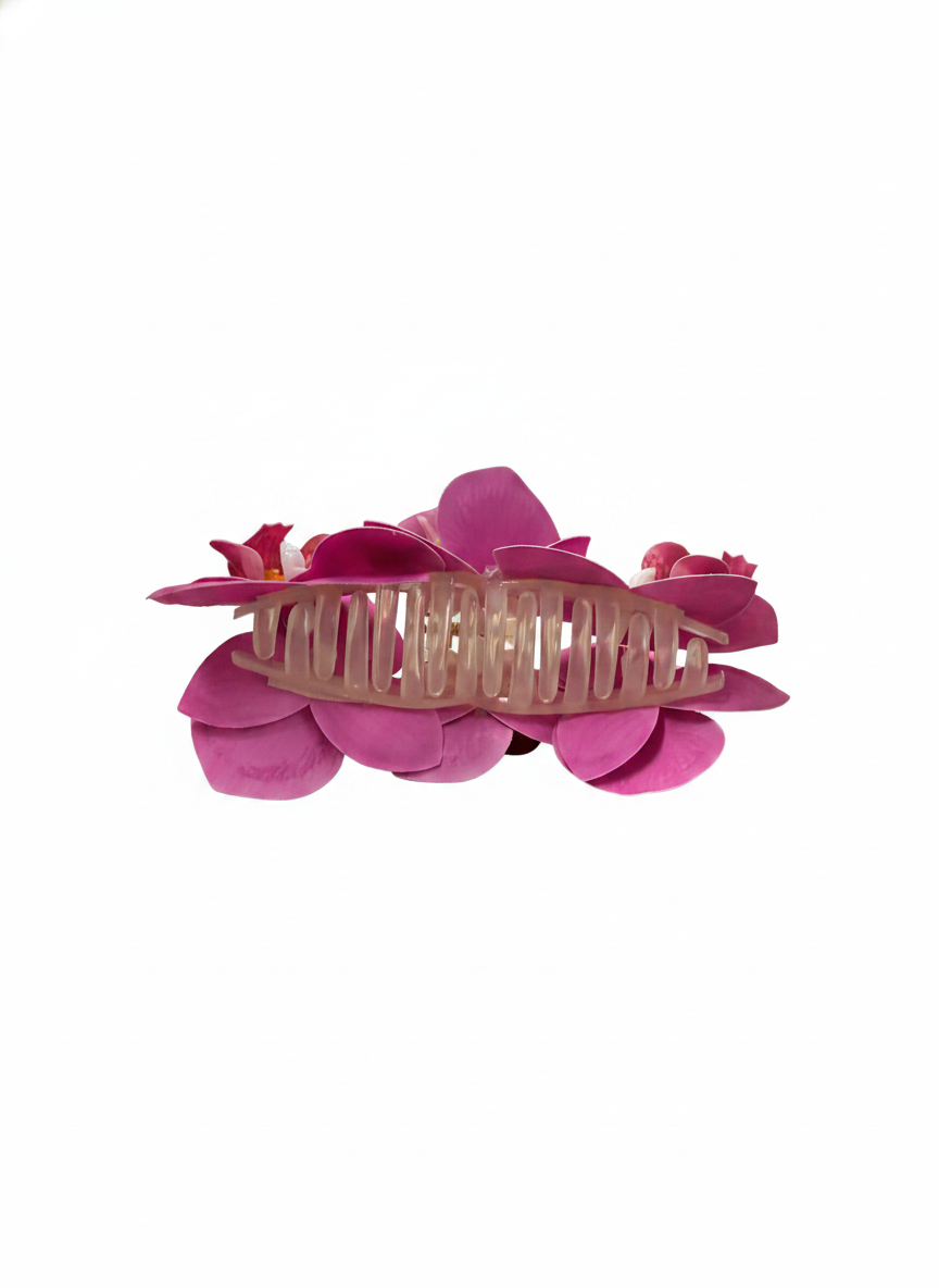 A pink TRIPLE FLOWER CLAW CLIP on a white background.
