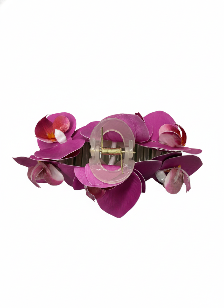 A pink TRIPLE FLOWER CLAW CLIP on a white background.