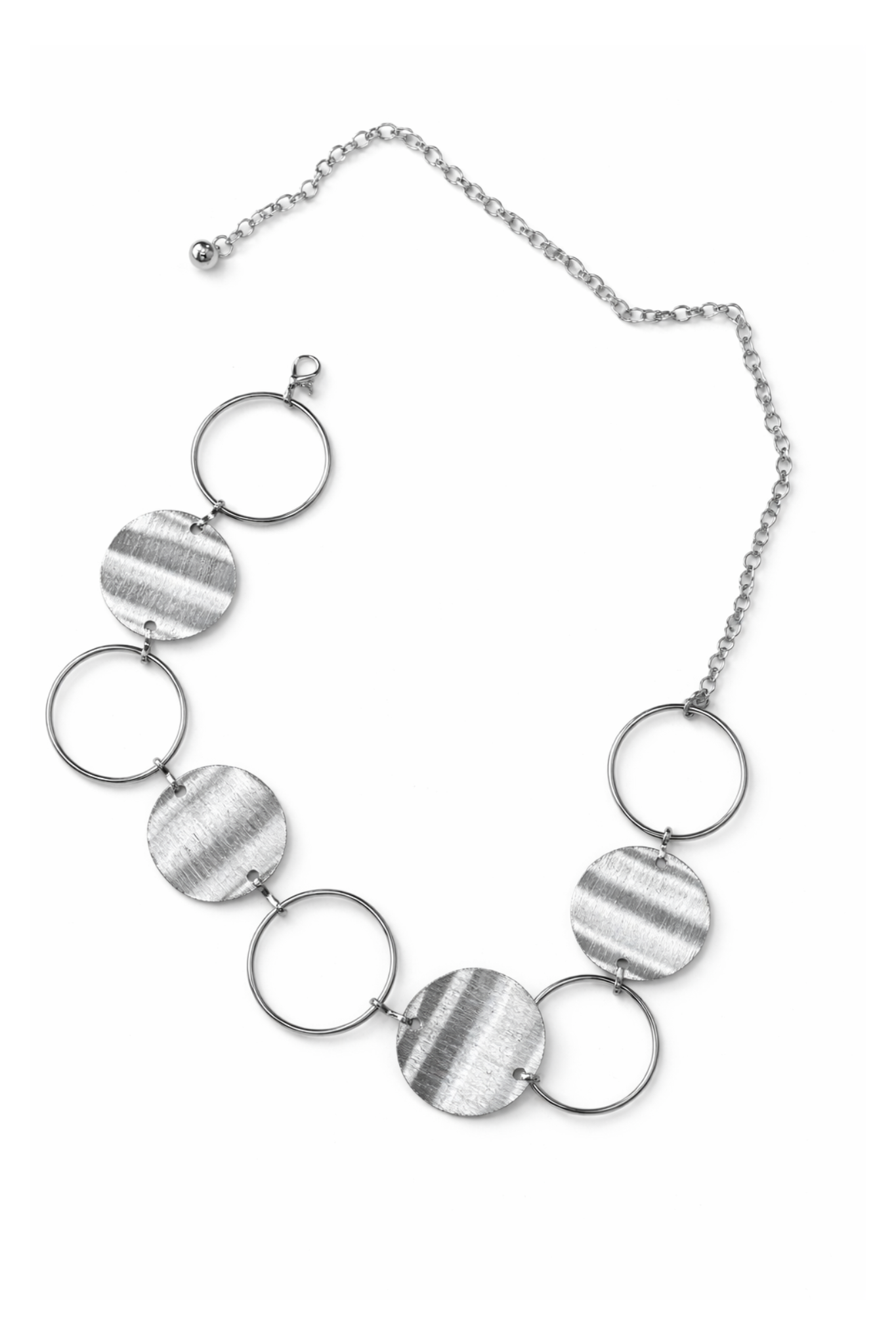 Silver necklace with circular beads on a white background